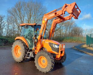 SOLD KUBOTA M6060 TRACTOR WITH LOADER